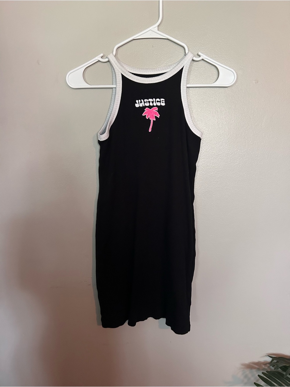 5 for $20! 
Justice Girls Black Tank Dress with Pink Palm Graphic